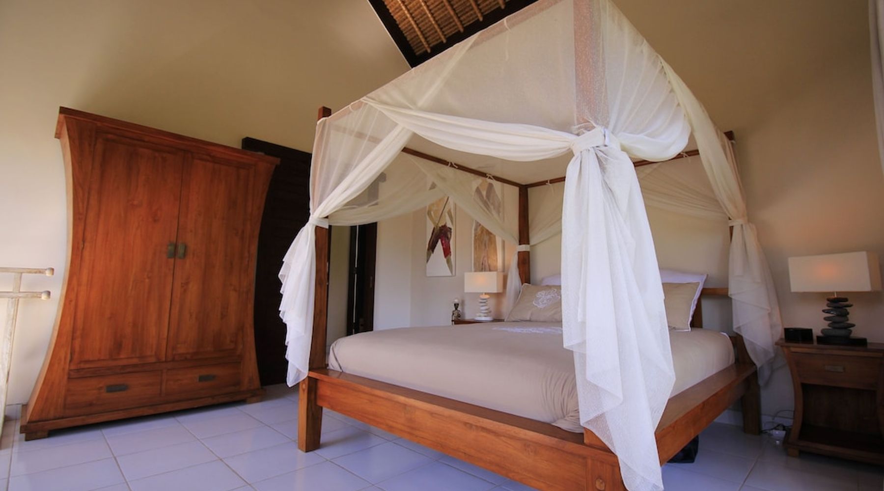 An elegant bed with an outside view