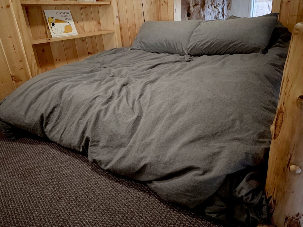 Sleeping loft with double bed.