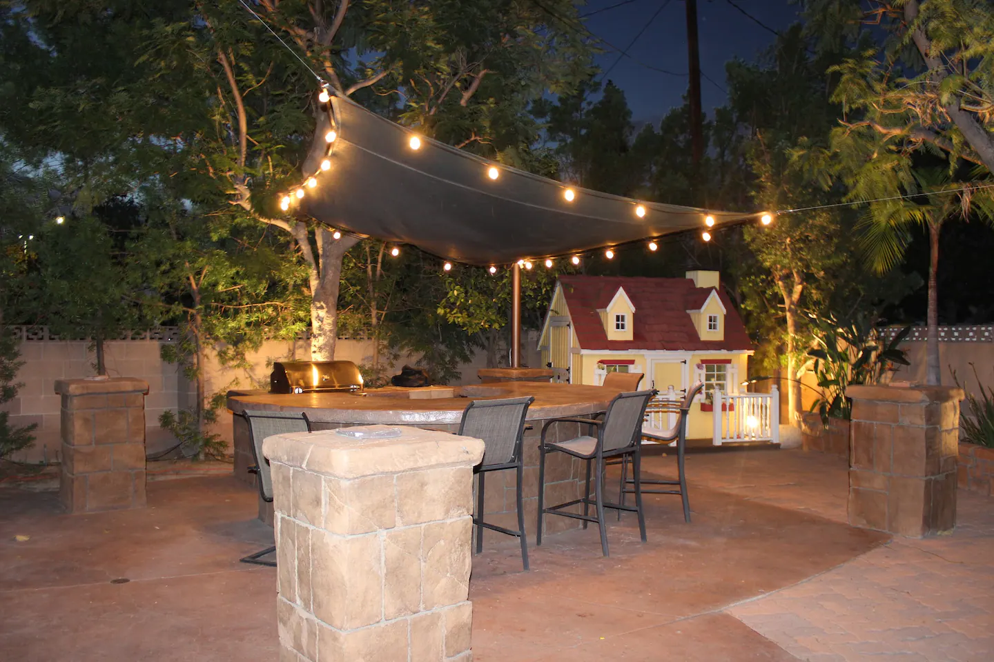 Outdoor Grilling Area with a Mini Fridge