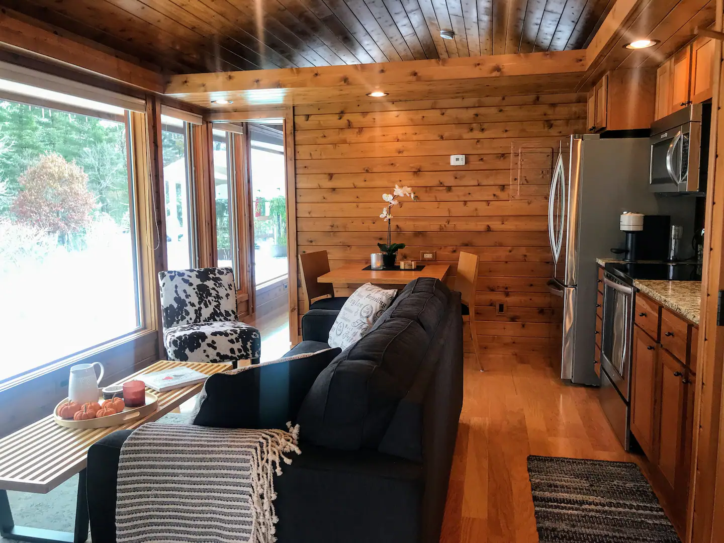 Swing open the wide French doors and enter the living room.