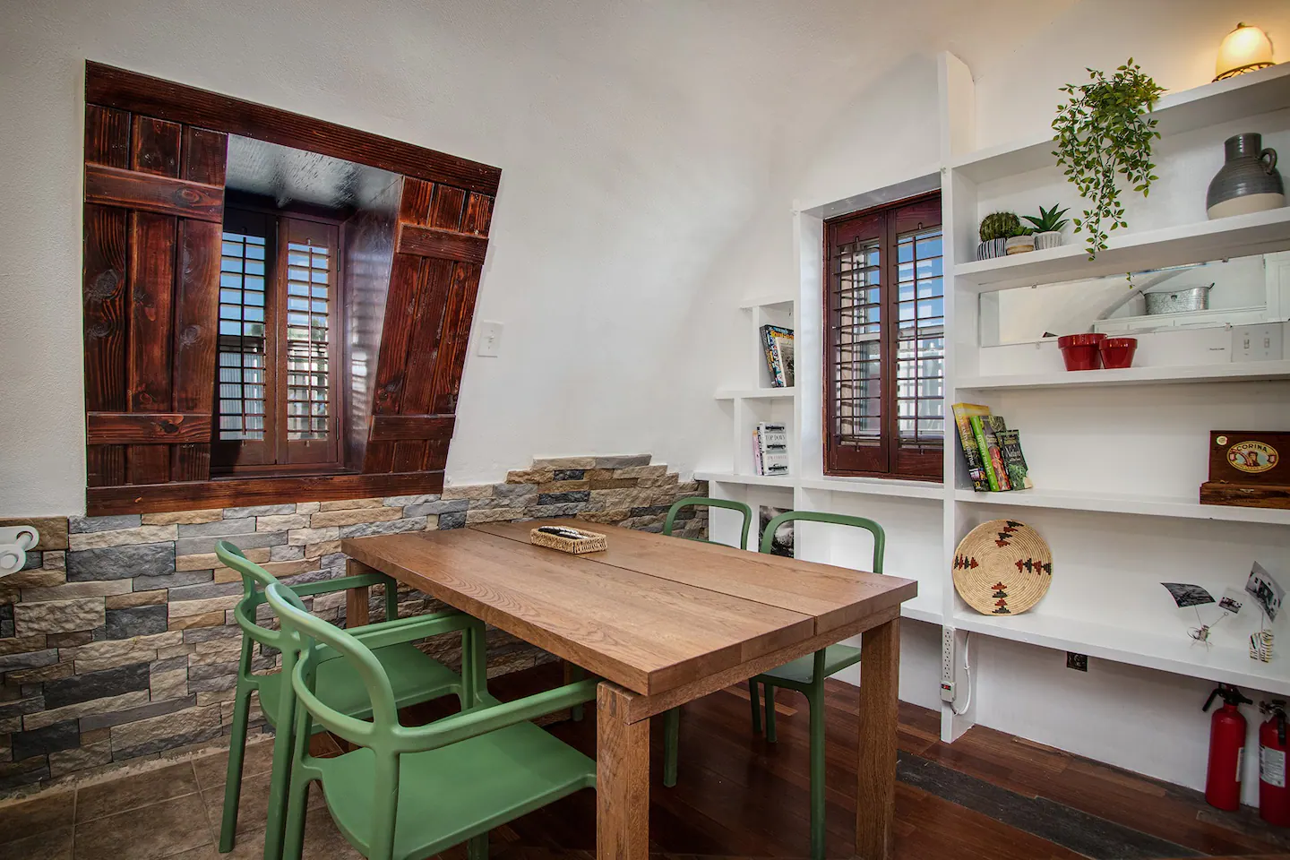 A dining table that can accommodate 4 individuals.