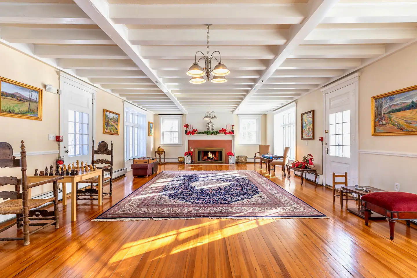 Battenkill Valley Mansion's ballroom with a fireplace