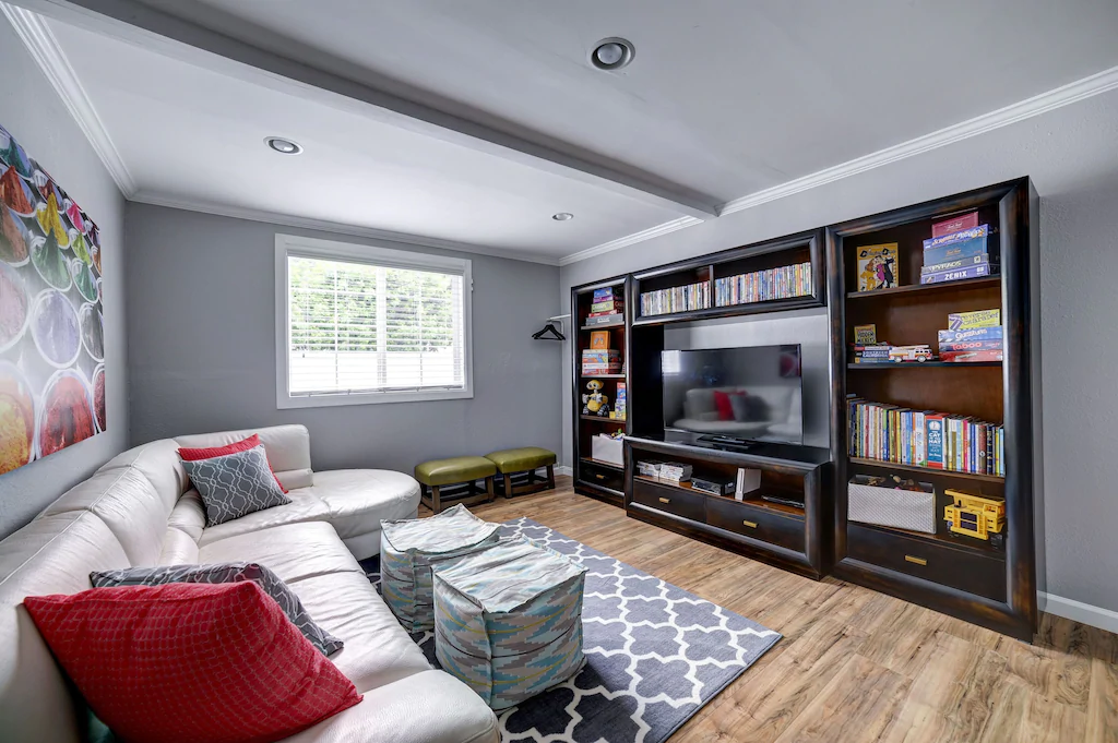 The 10th bedroom serves as a den and has a fully supplied entertainment center with a Wii.