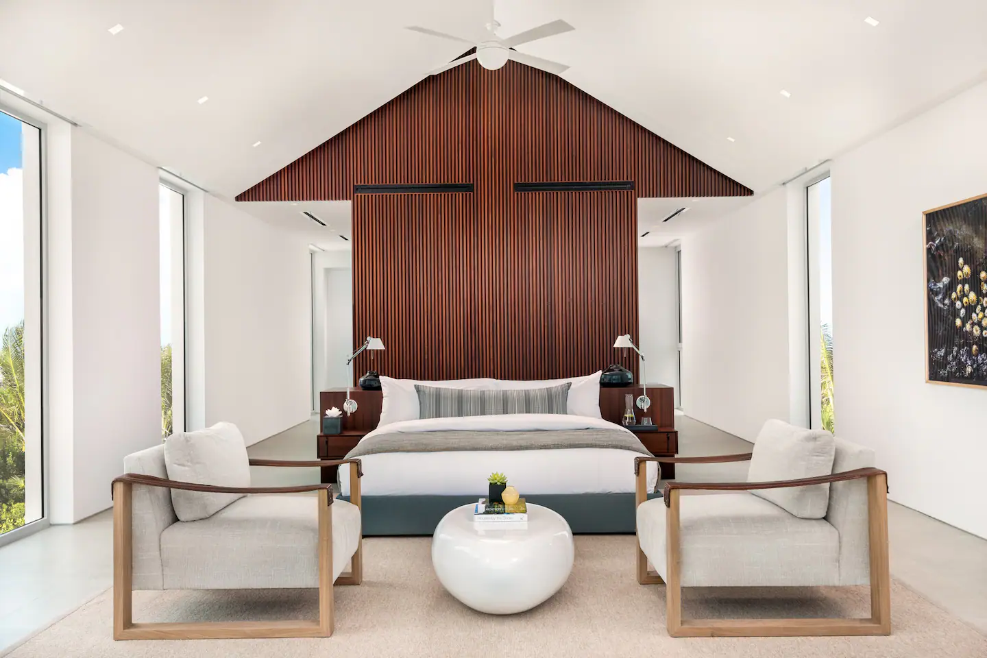A lavish bedroom with king sized bed.