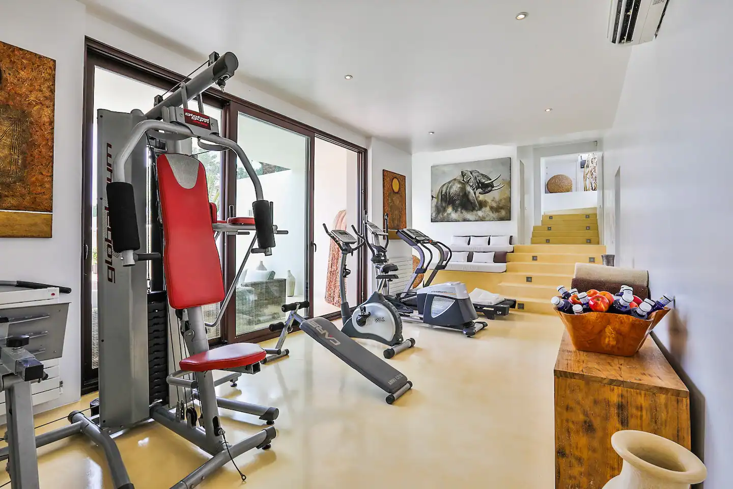 A well-equipped gym with state-of-the-art fitness machines and ample space, perfect for workouts and maintaining an active lifestyle.