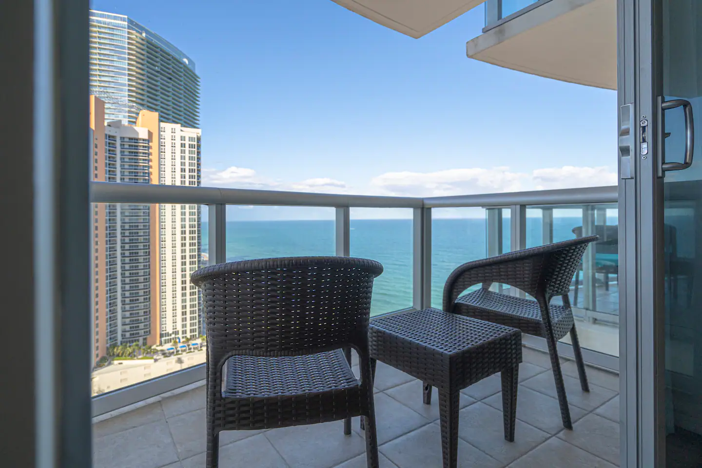 Relax on your balcony facing both the beach and the bay!