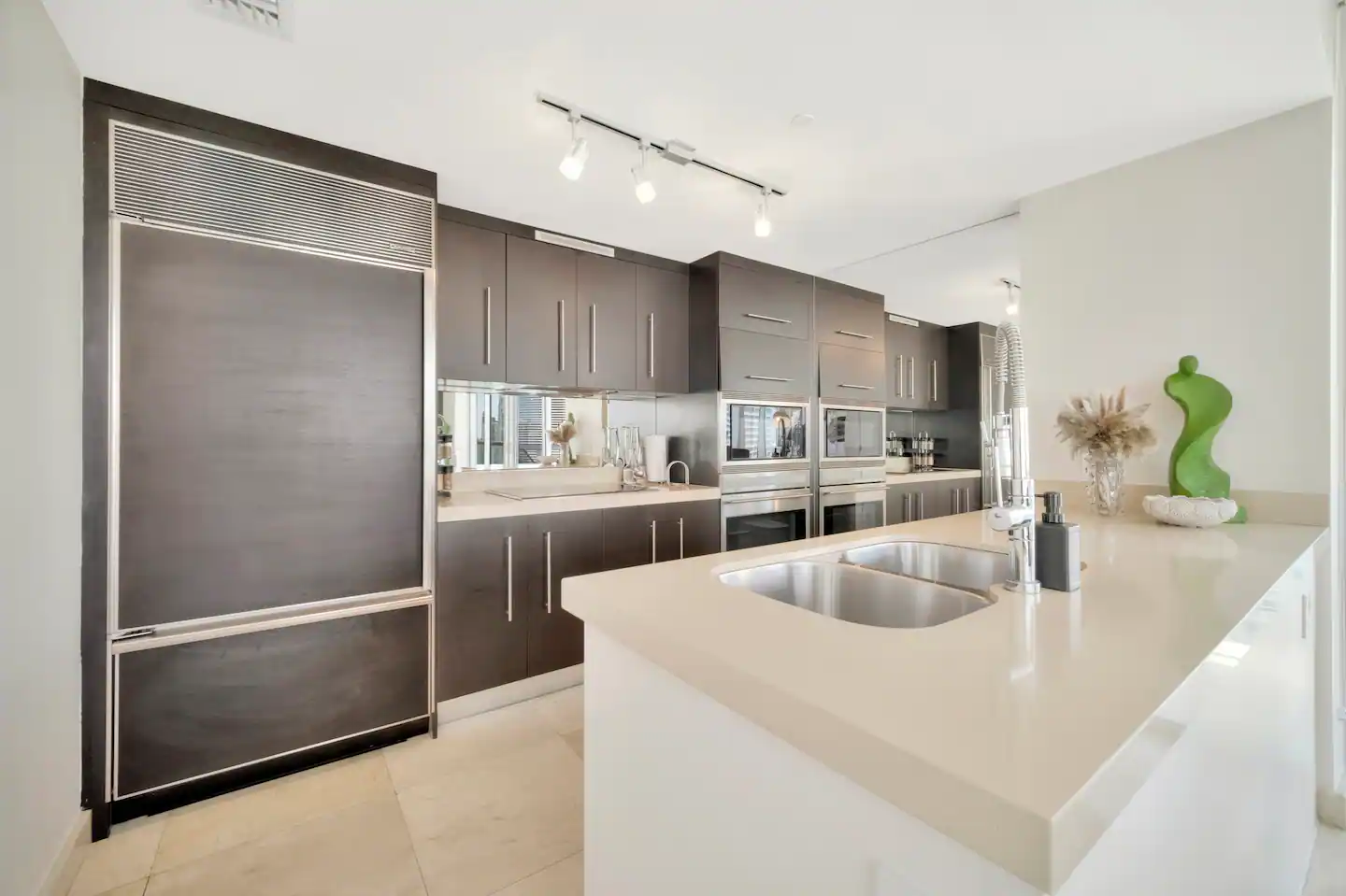Full subzero appliances with nesspresso coffee machine and blender in apartment