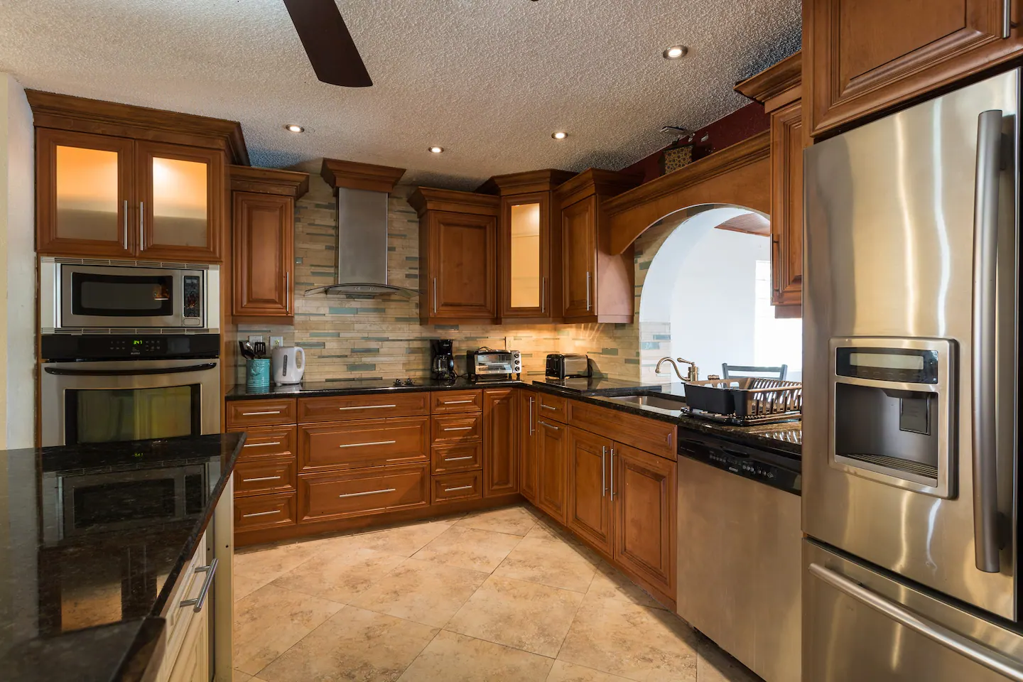 Cherry-wood Kitchen with Stainless Steele Appliances / Island & Granite Tops