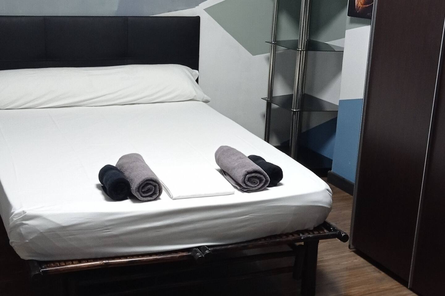 Room with entrance to a special play space and private attached bathroom for adults.