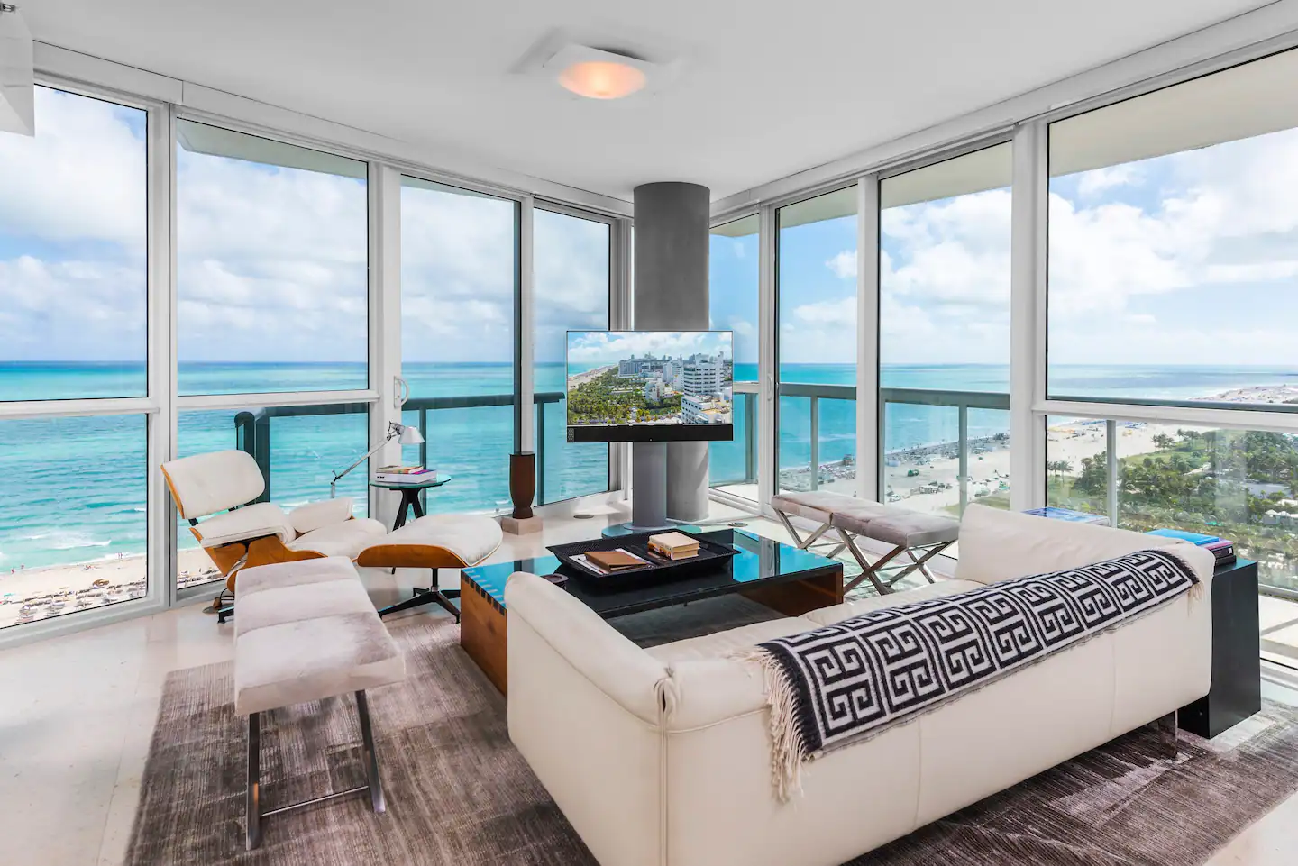 The sofa and lounger are tucked into the corner for the best beach vistas