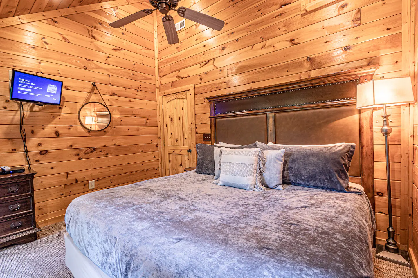 There is a private bedroom with a king bed and a shared bath.