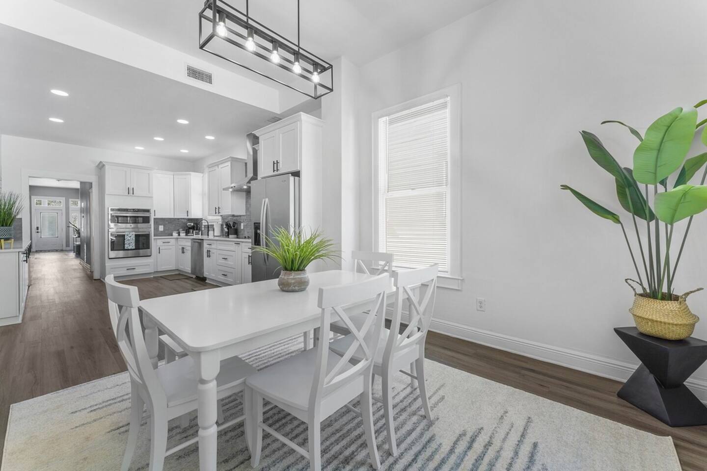 It has a spacious kitchen with a dining area.