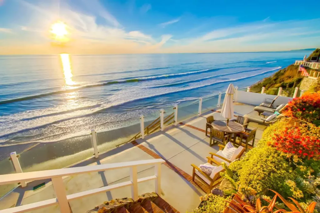 Dual expansive ocean view patios to enjoy sunsets...with rare direct beach access!