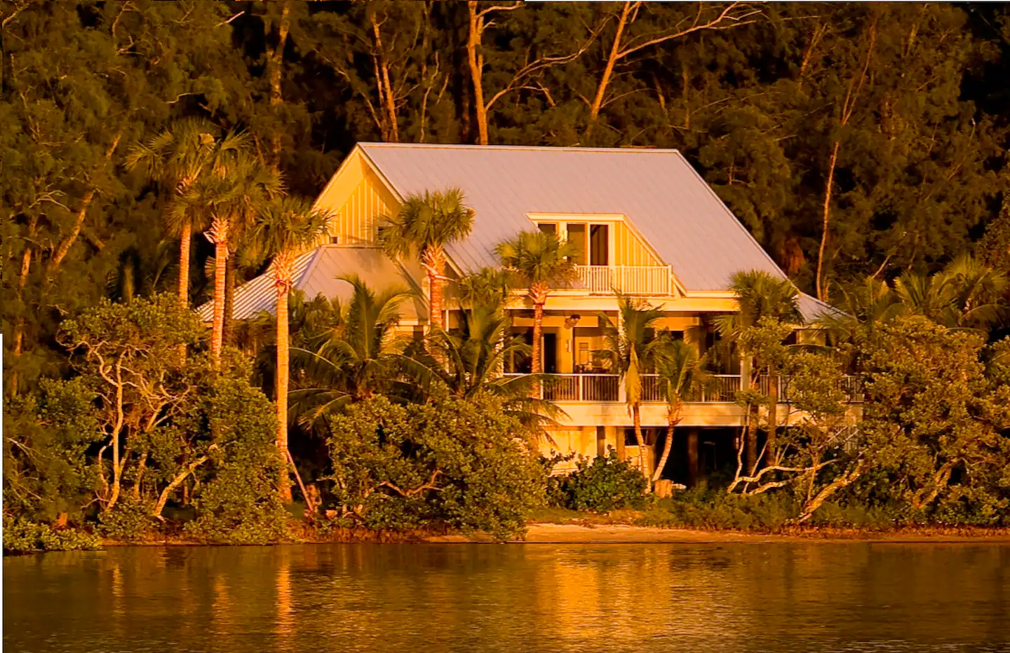 House from water at Sunset
