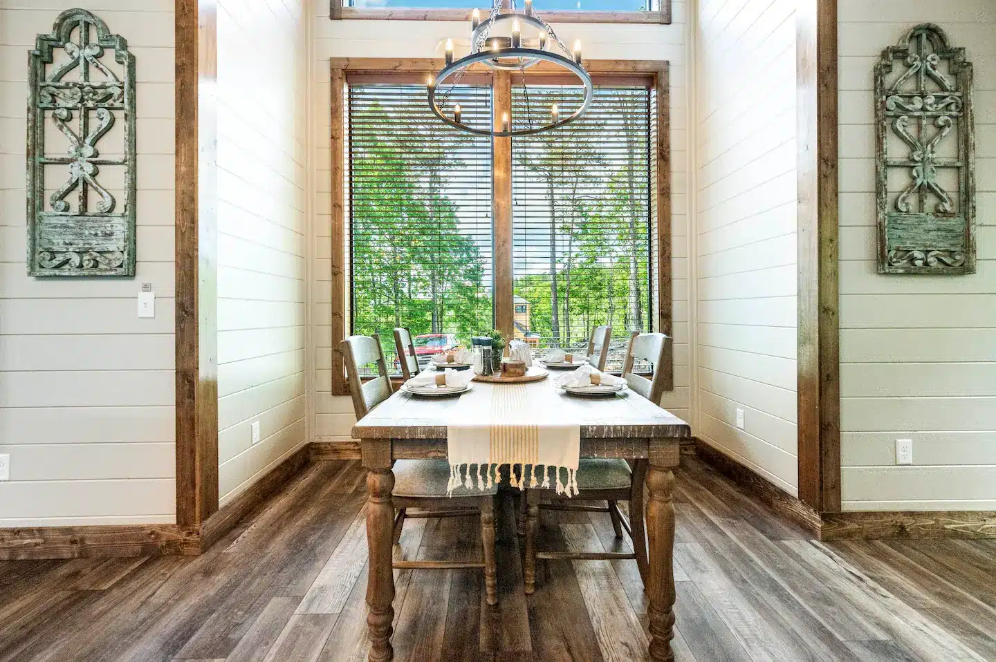 Our dining nook is an exquisite space with super high ceilings (30') and our farmhouse table seats four.