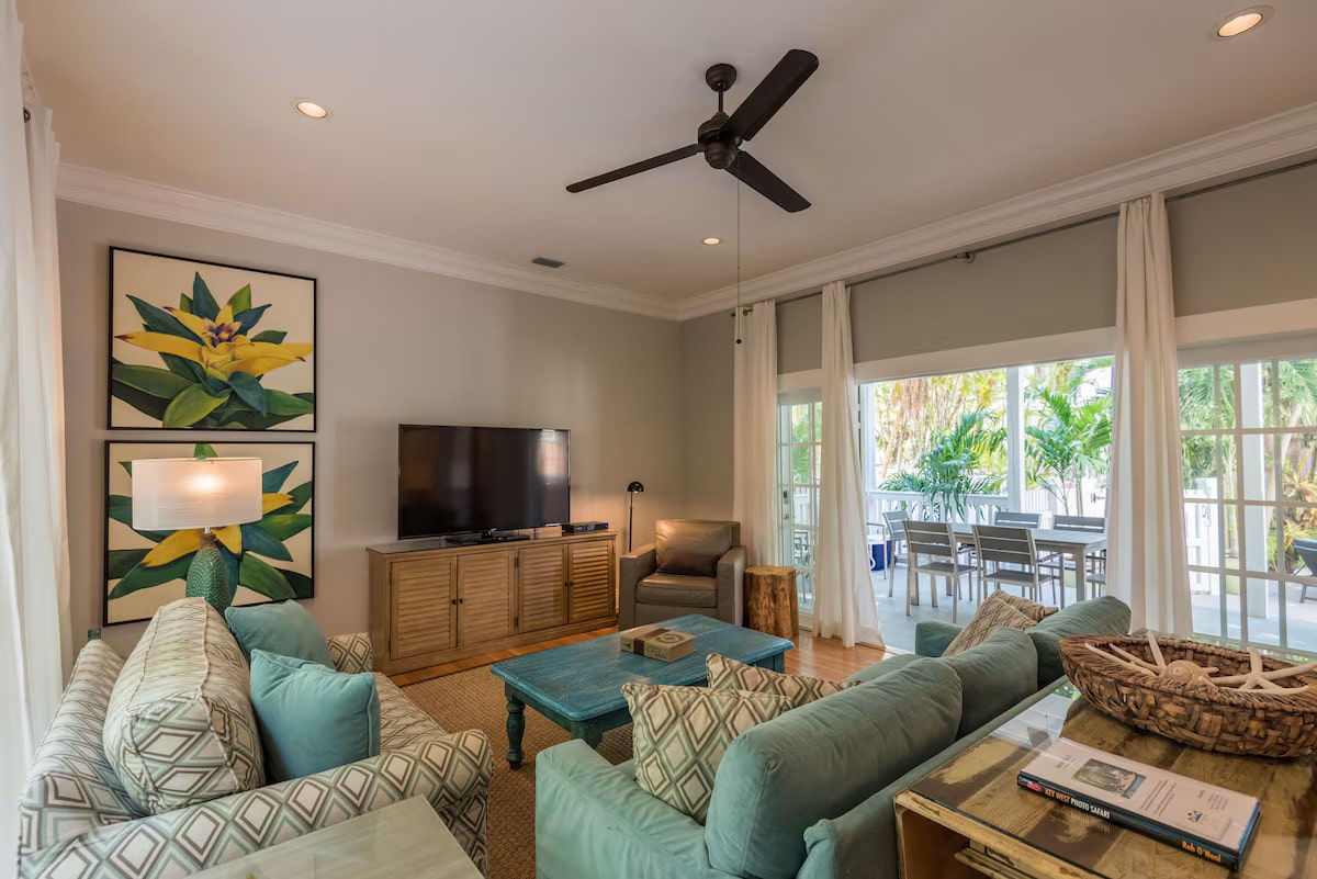 Large french doors allow the natural light to brighten your living room.