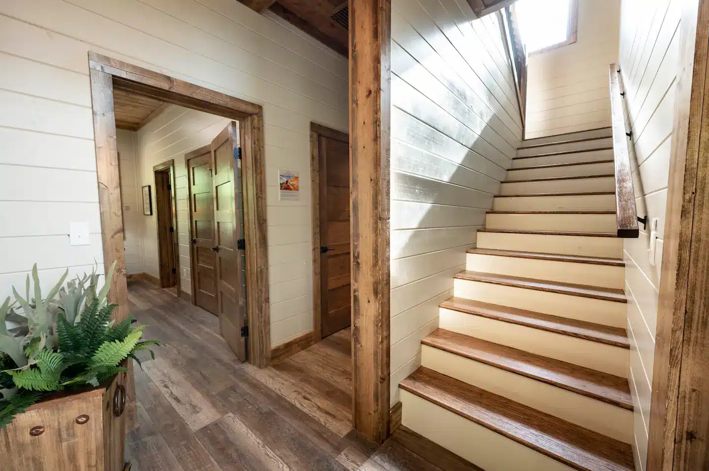 Here's a view of the stairwell to the upstairs and the entrance to the downstairs master bedroom.