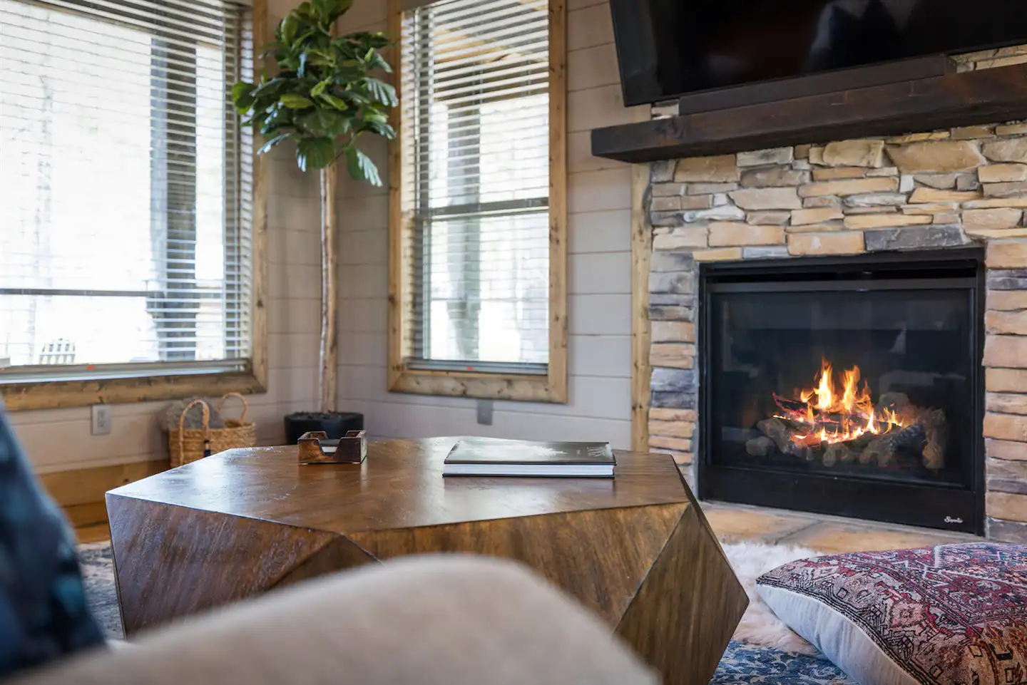 Sitting by the gas fireplace.
