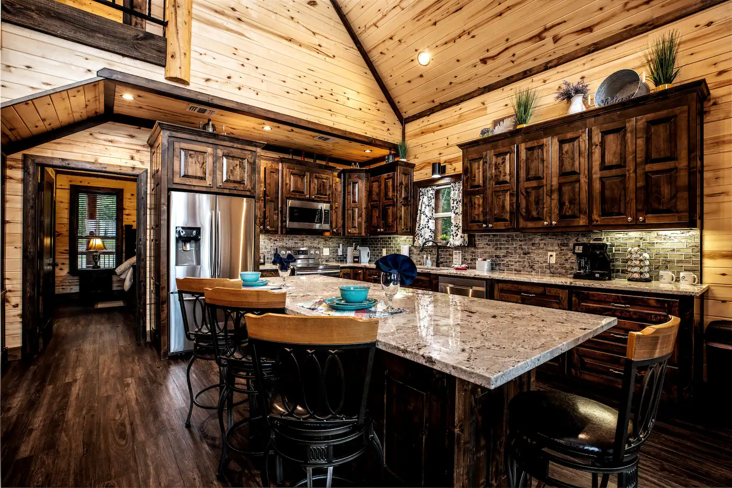 Gorgeous Knotty Alder Custom Cabinets fully stocked with cups/plates/dishes/small appliances/coffee maker and everything you'll need to cook!