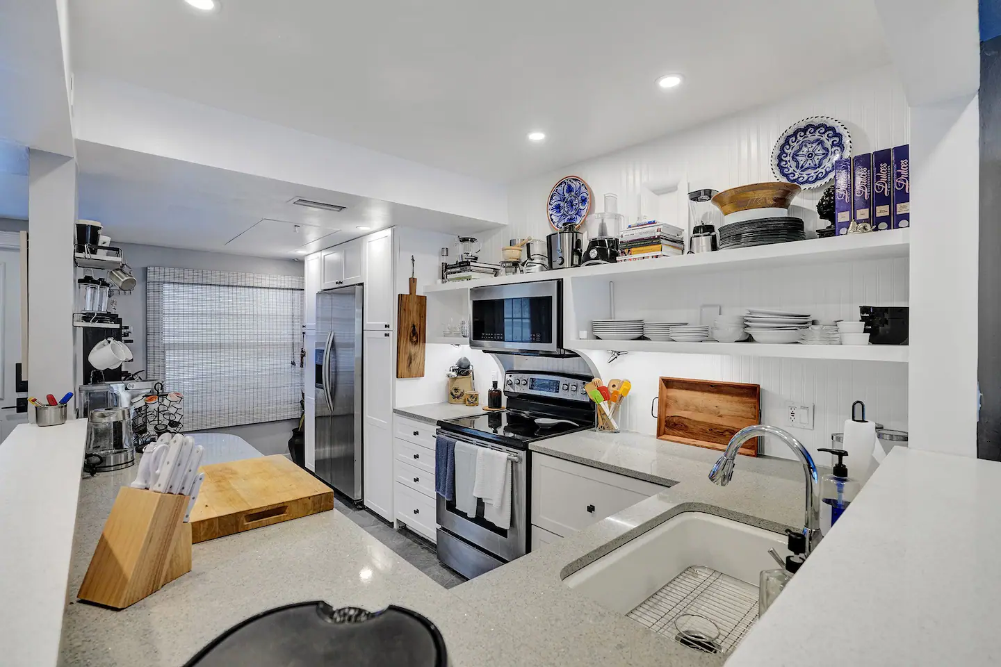 This home showcases a large fully equipped kitchen.