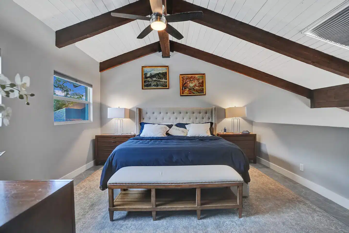 Second bedroom & bathroom sits loft-style on the second floor.